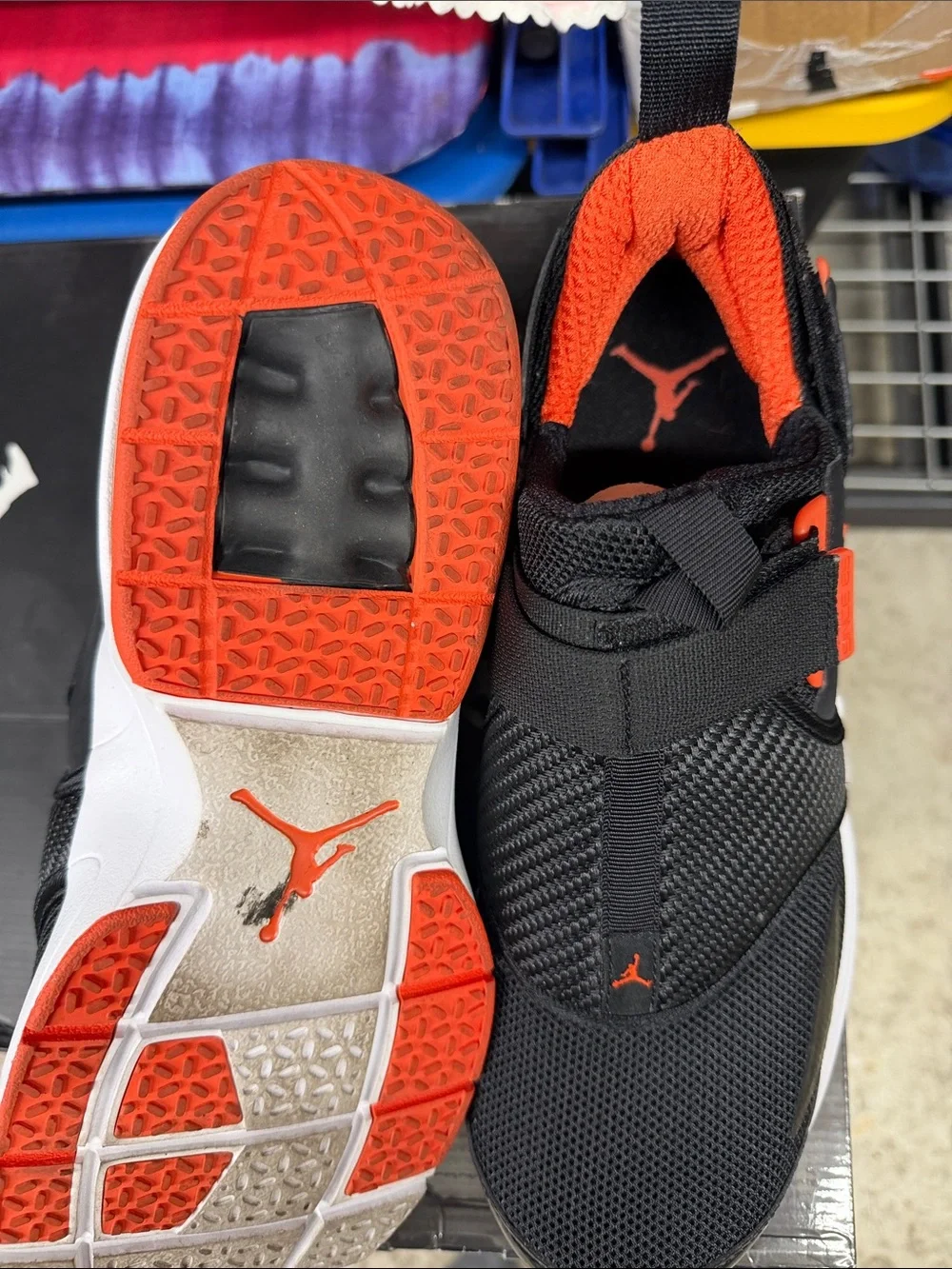Jordan Black and Orange Strap Sneakers